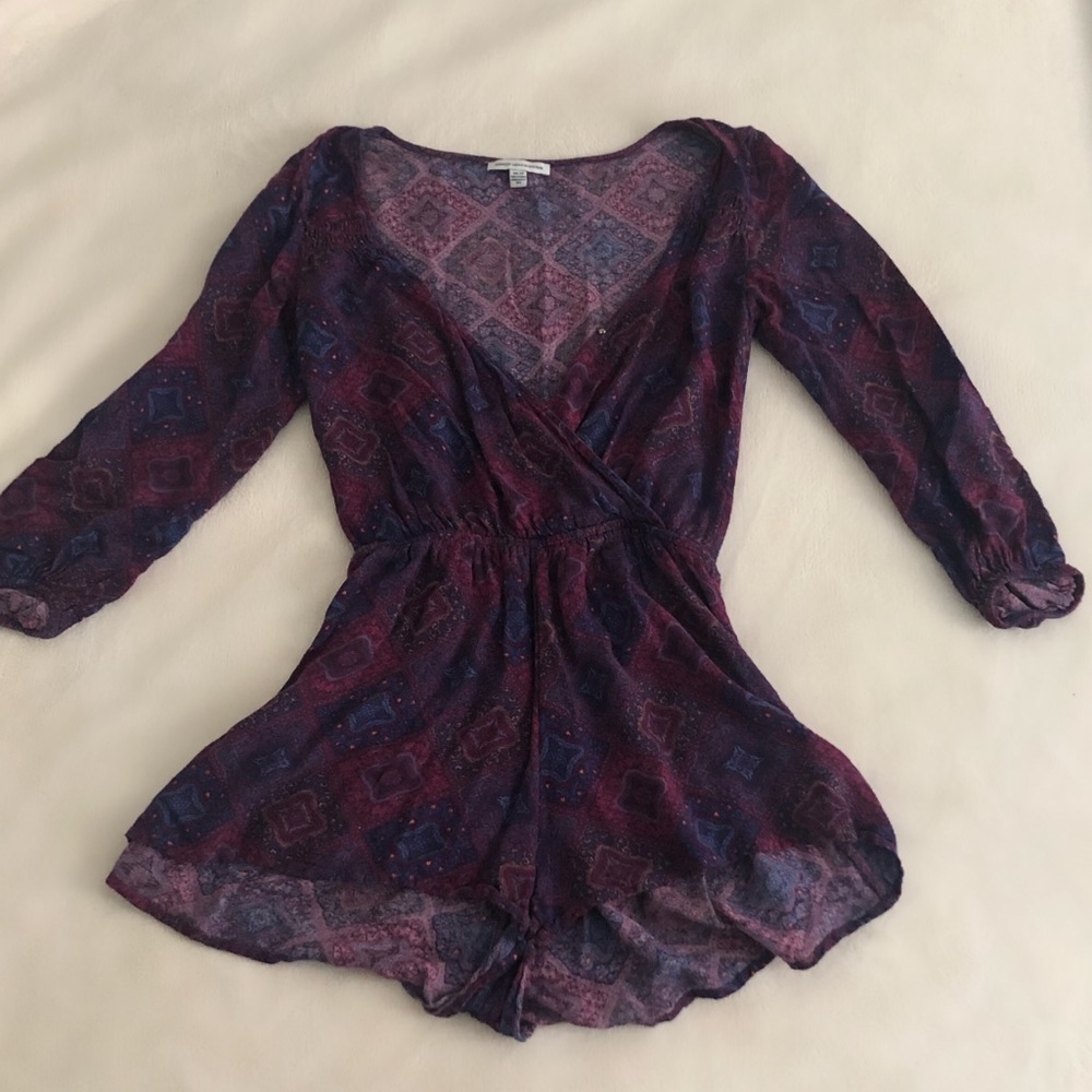 Plunging neckline long sleeve romper